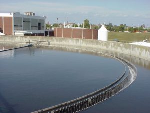 One of three intermediate settling tanks at the Kline's Island Wastewater Treatment Plant. In this photo, the tank is being refilled after a cleaning. LCA 